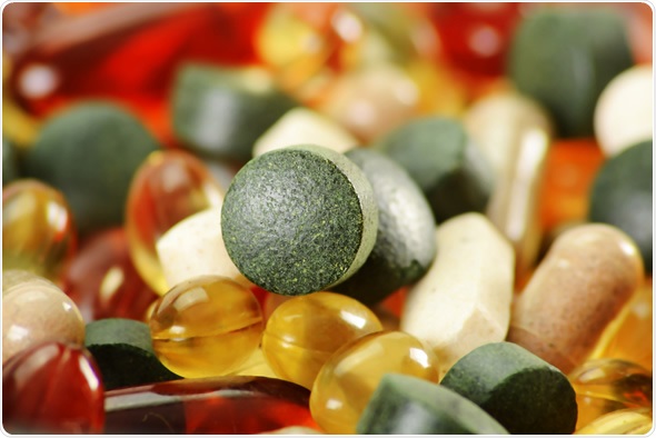 Composition with dietary supplement capsules and tablets. Variety of drug pills Composition with dietary supplement capsules and tablets. Variety of drug pills
