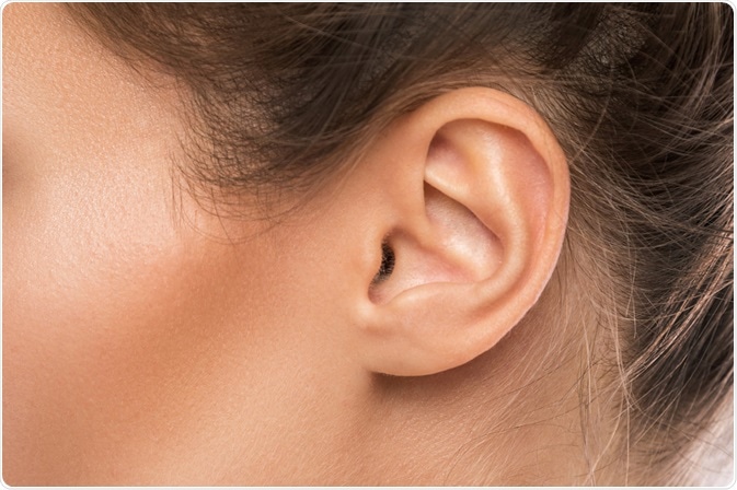 Picture of woman showing ear Picture of woman showing ear