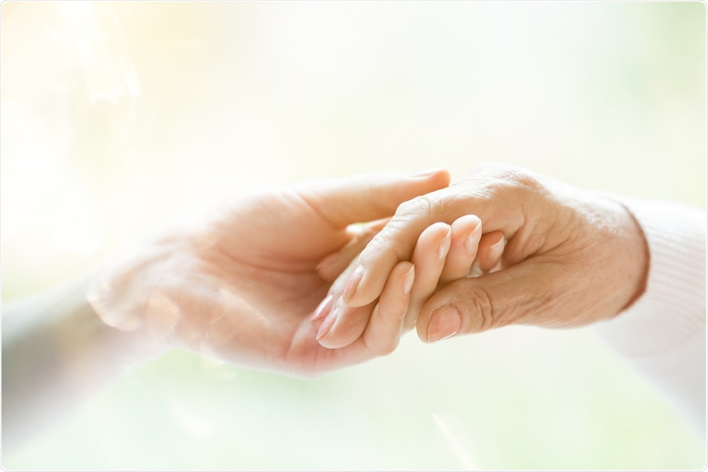 Holding hands - parkinson
