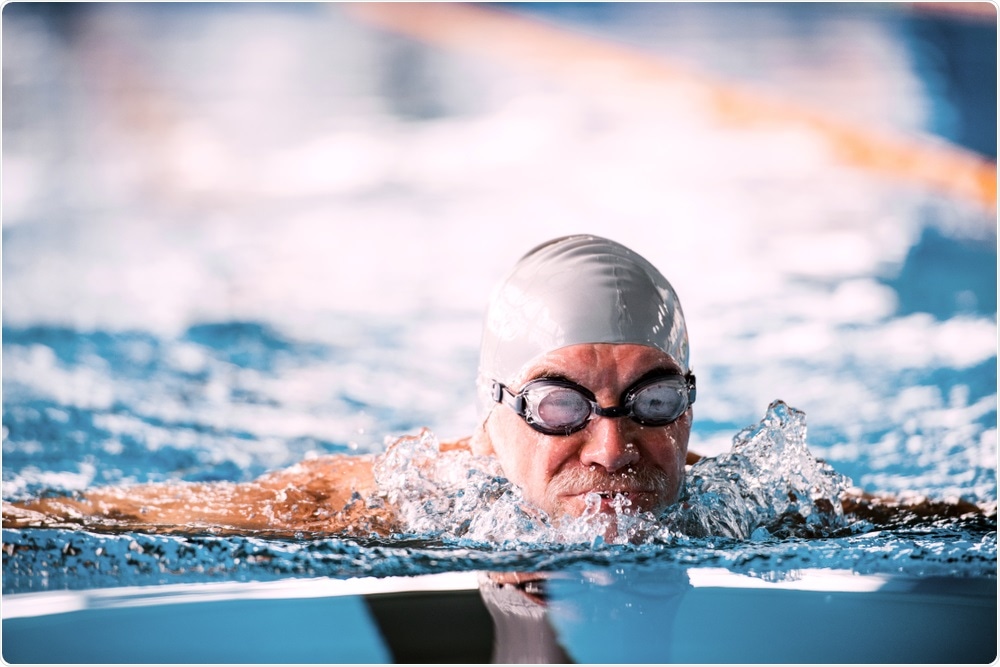 Old man swimming