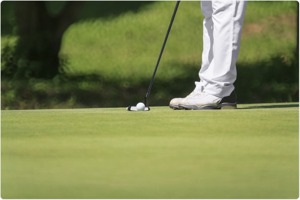 Man playing golf