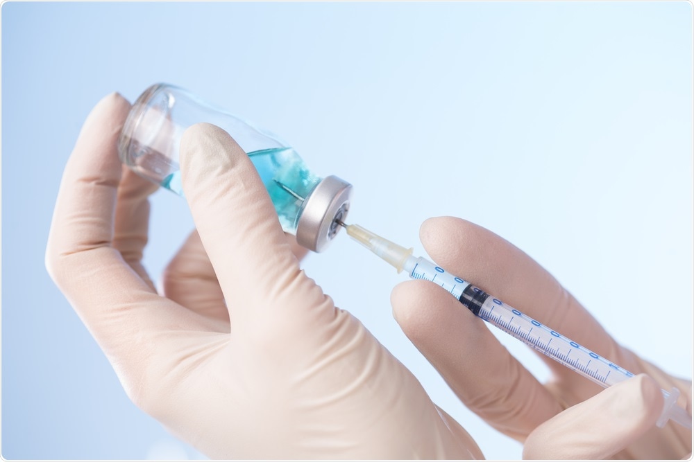 Doctor administering HPV vaccine