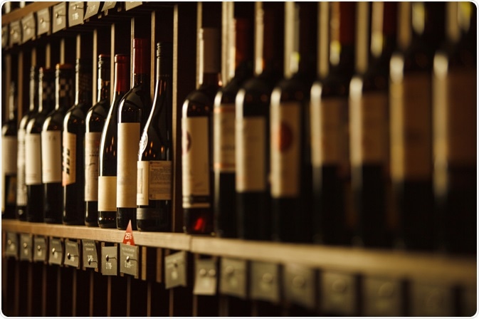 Wine bottles lined up in cellar Wine bottles lined up in cellar