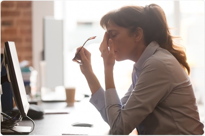Exhausted woman at work Exhausted woman at work
