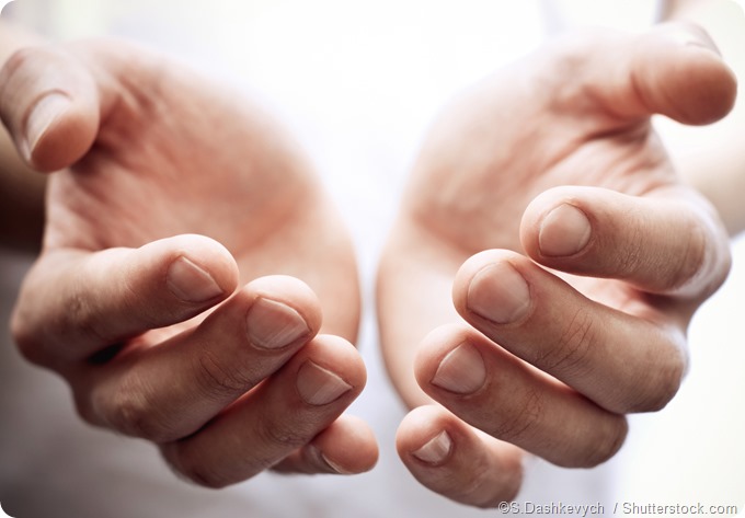 Holding out hands skin