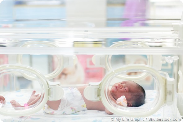 Newborn baby in hospital post delivery room