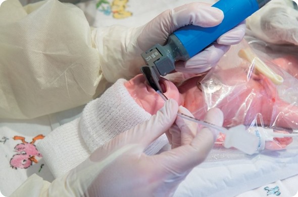 Premature Anne placing an ET tube Laerdal