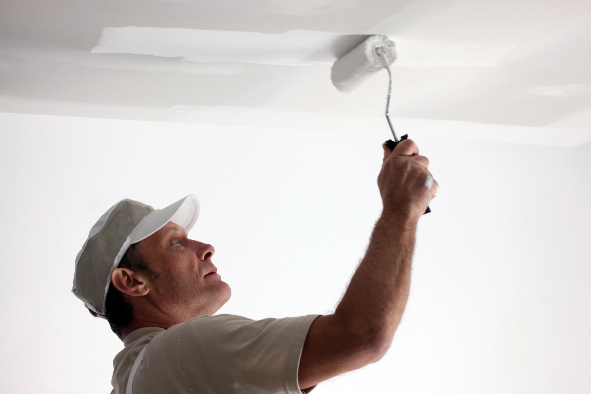 Occupational workers such as painters can experience tennis elbow. Image Credit: Phovoir / Shutterstock