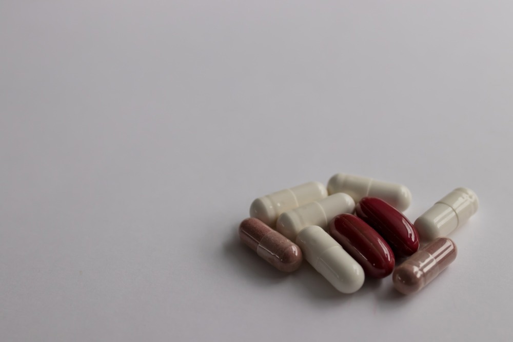 Multivitamin and medicine stack.