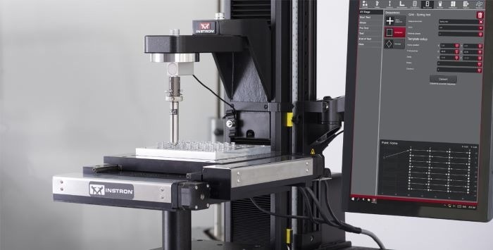 Automated XY stage for tensile, compression, and flexure testing