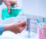 Surfactant-containing oral mouthwashes target the lipid envelope of SARS-CoV-2