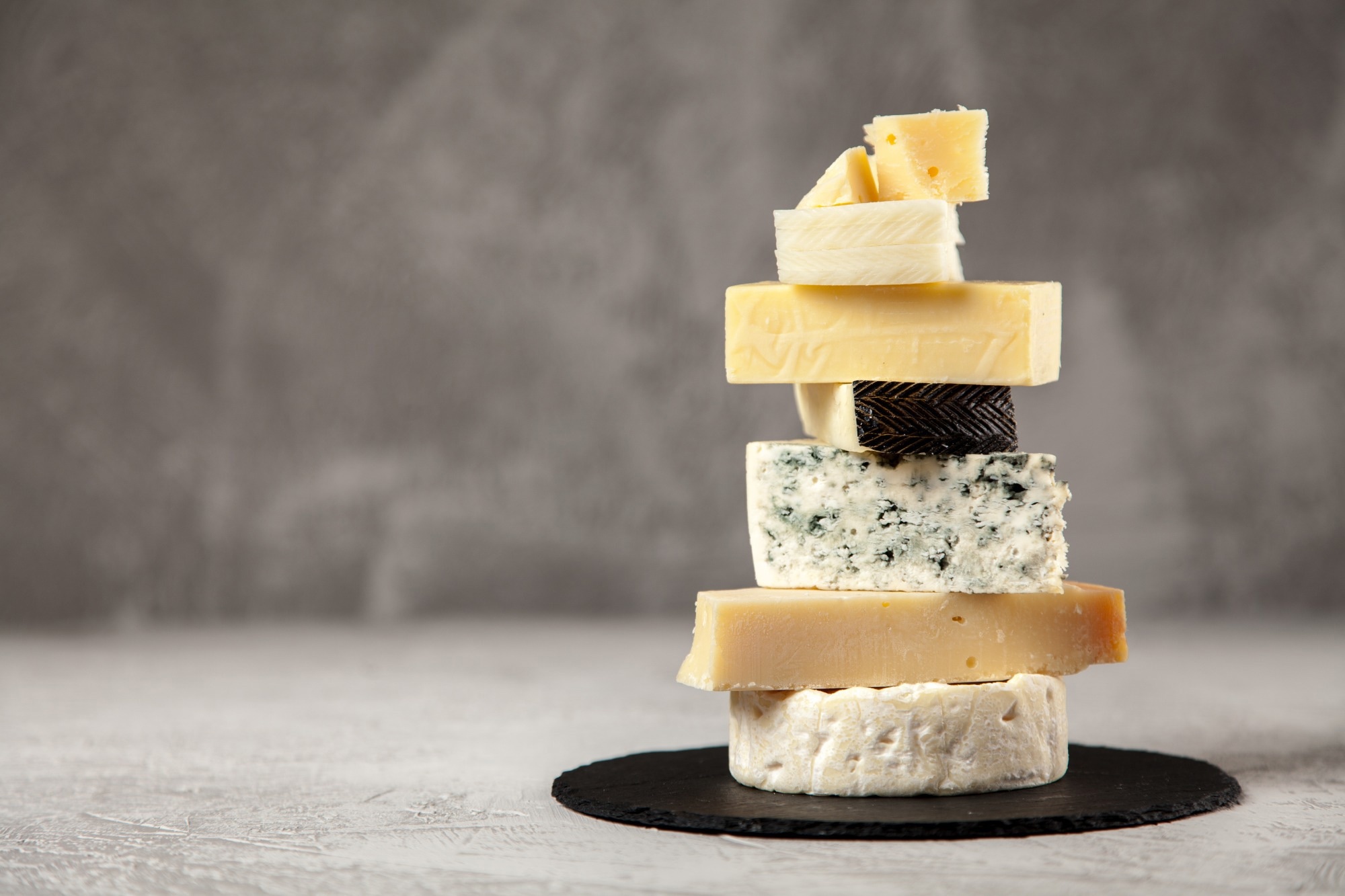 Study: Functional modulation of the human gut microbiome by bacteria vehicled by cheese. Image Credit: George Dolgikh / Shutterstock