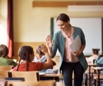How is academic achievement linked to wellbeing?